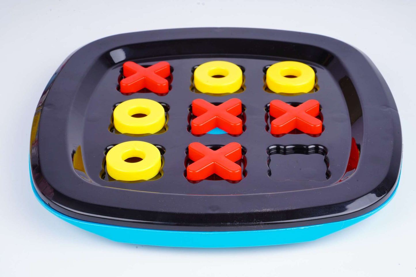 Colorful XOX Game for Kids board promoting brain development and family fun