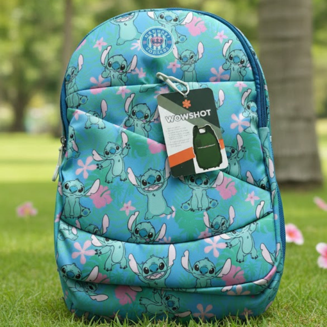 Backpack with cartoon character design on grass with palm trees in the background