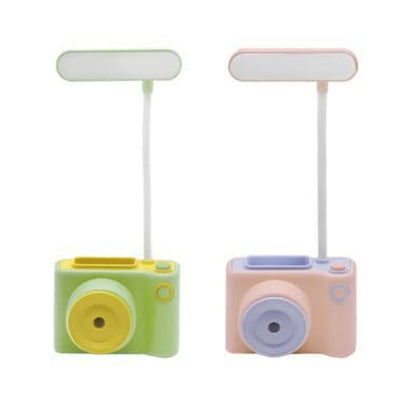Two small toy cameras with stand attachments on a white background