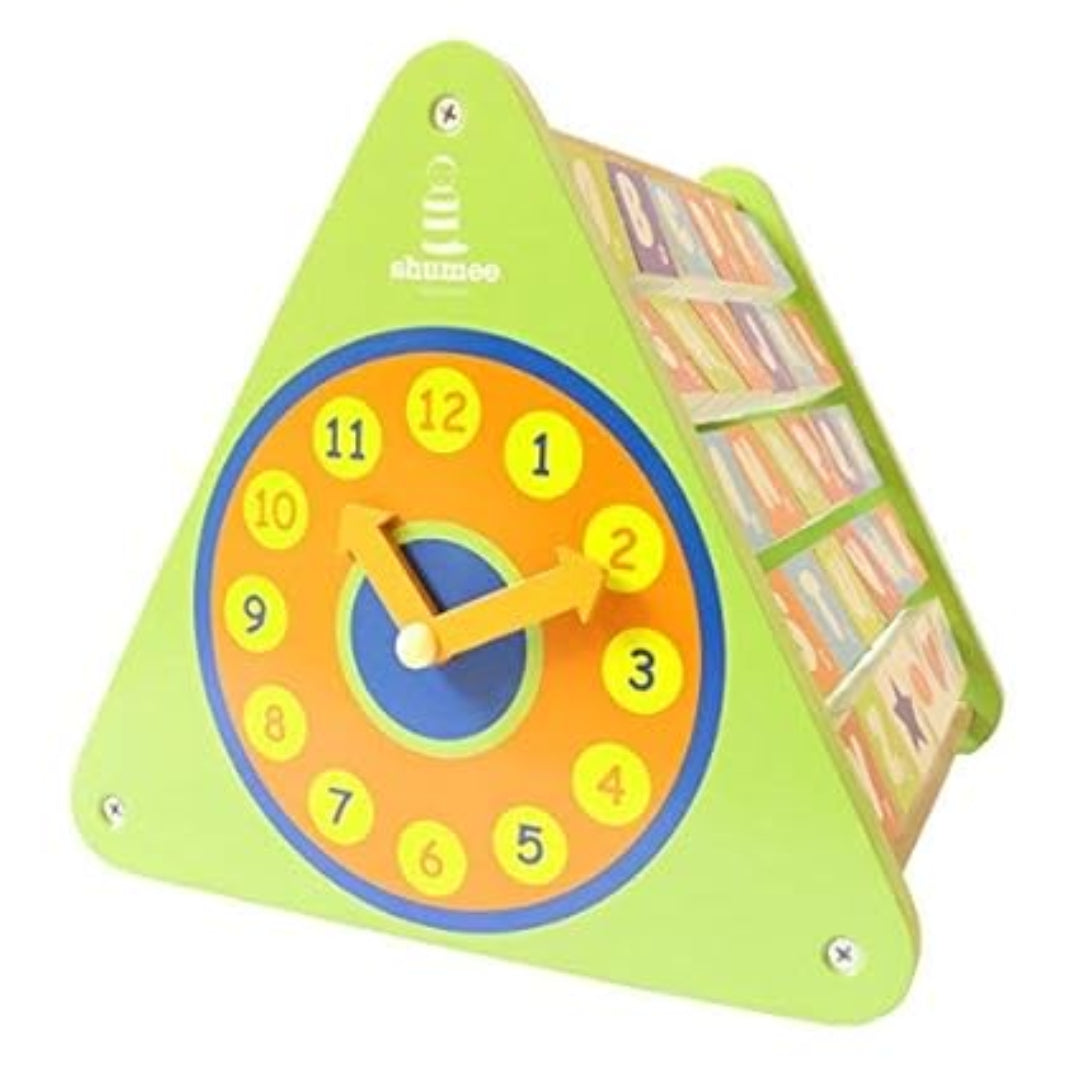 Colorful children's clock with bookshelf on a white background