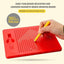 Red magnetic beads drawing board with a hand using a yellow tool, on a beige background.