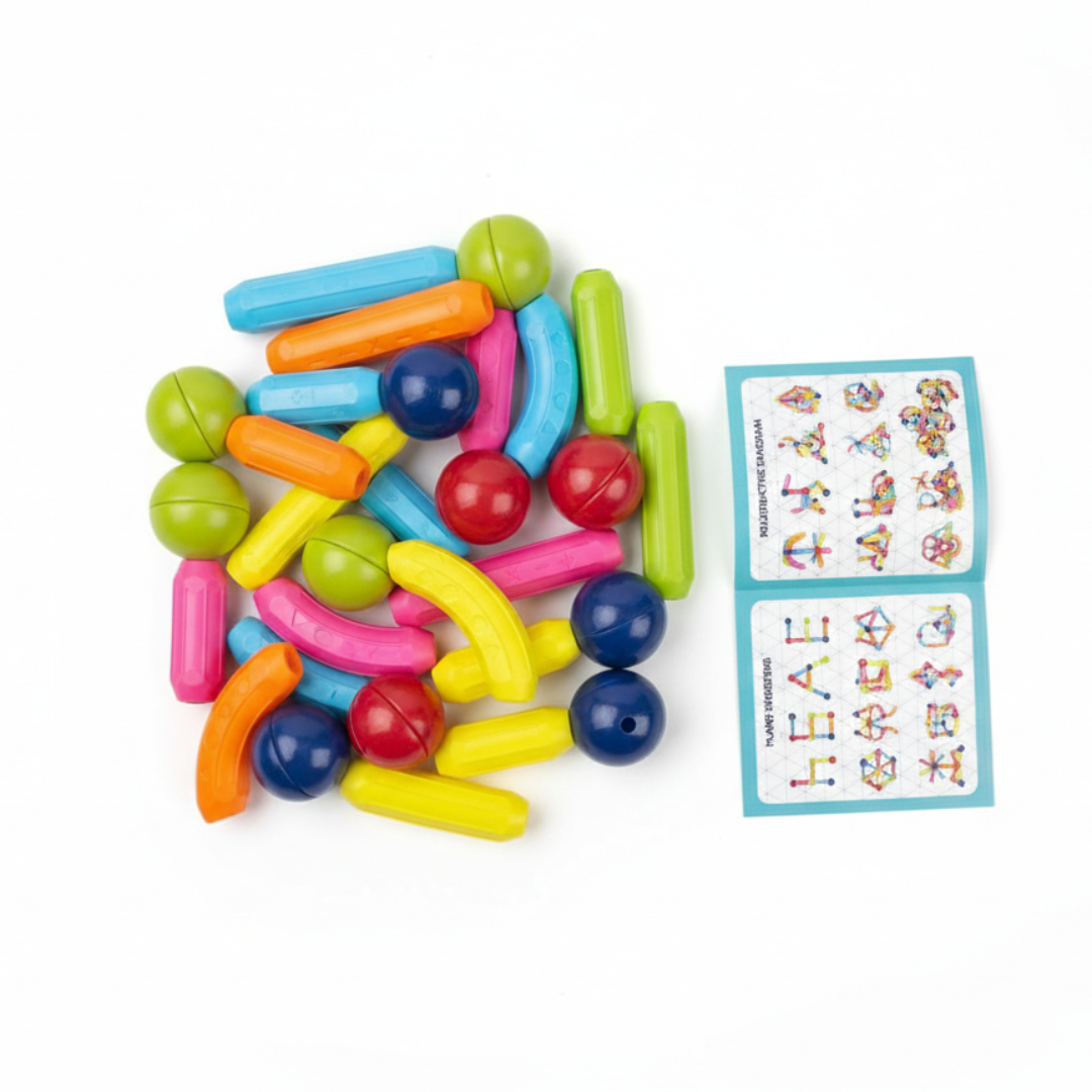 Colorful plastic beads with a small card on a white background