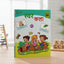 Colorful children's book on a wooden surface with a blurred background