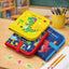 Three colorful children's books with dinosaur illustrations on a wooden table.