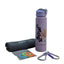 Pink water bottle with motivational text, gray towel, colorful rubber bands, and carabiner on a wooden surface.