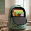 Backpack with school supplies on a table in a classroom