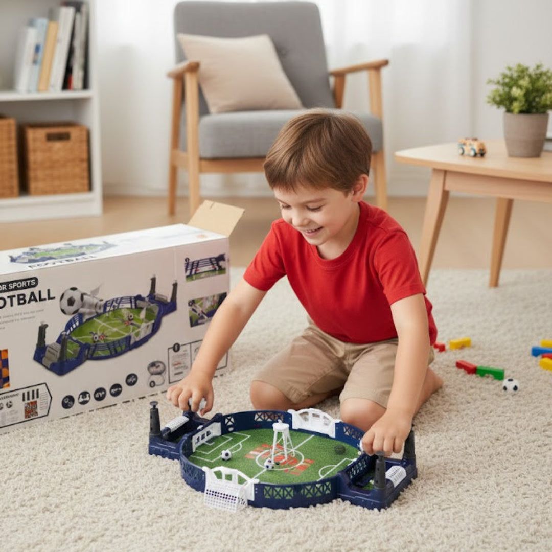 Child playing with a football game set on the floor in a living room.