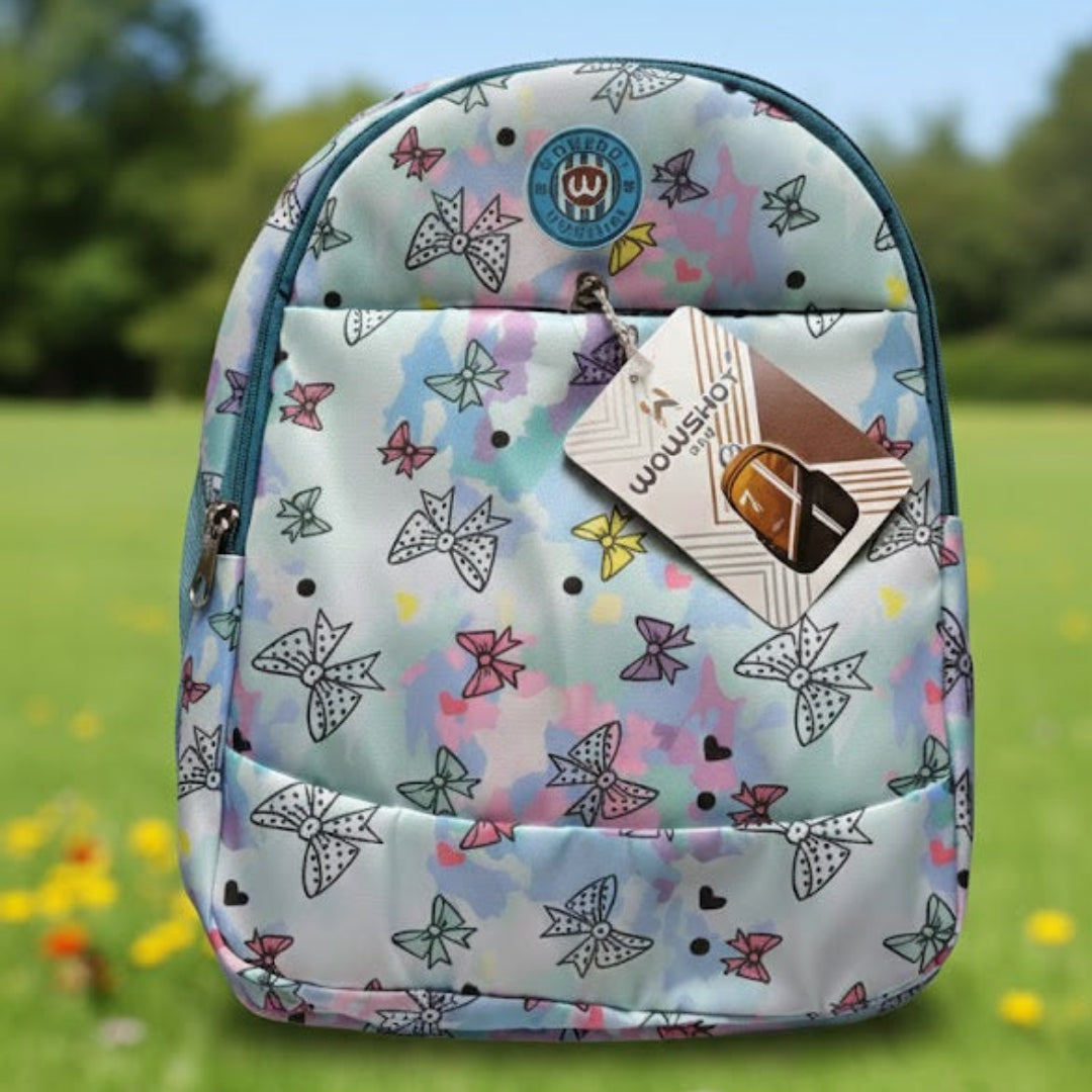 Backpack with butterfly pattern on grass