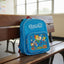 Blue backpack with cartoon characters on a wooden bench in a classroom.