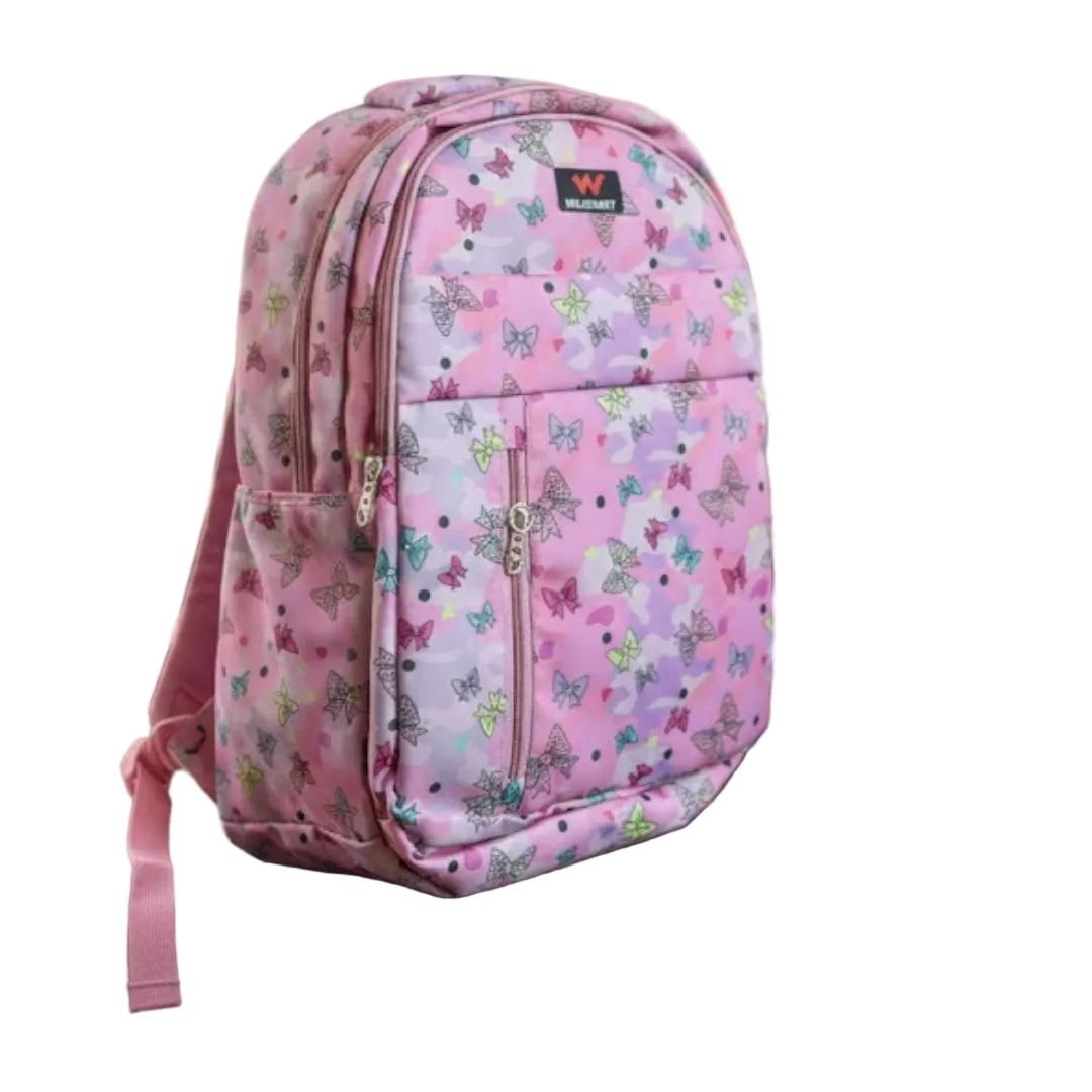 Pink floral backpack on a desk in a classroom setting